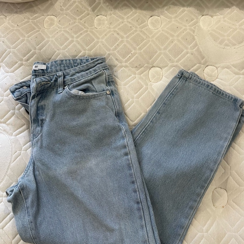light blue distressed jeans